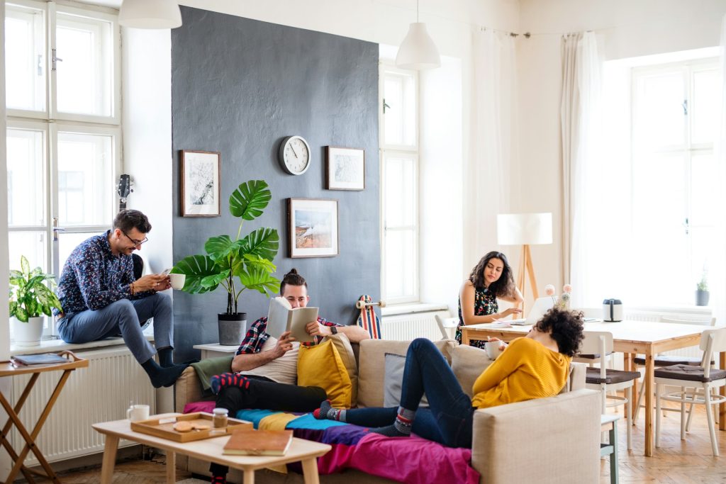 a-group-of-young-cheerful-friends-relaxing-indoors