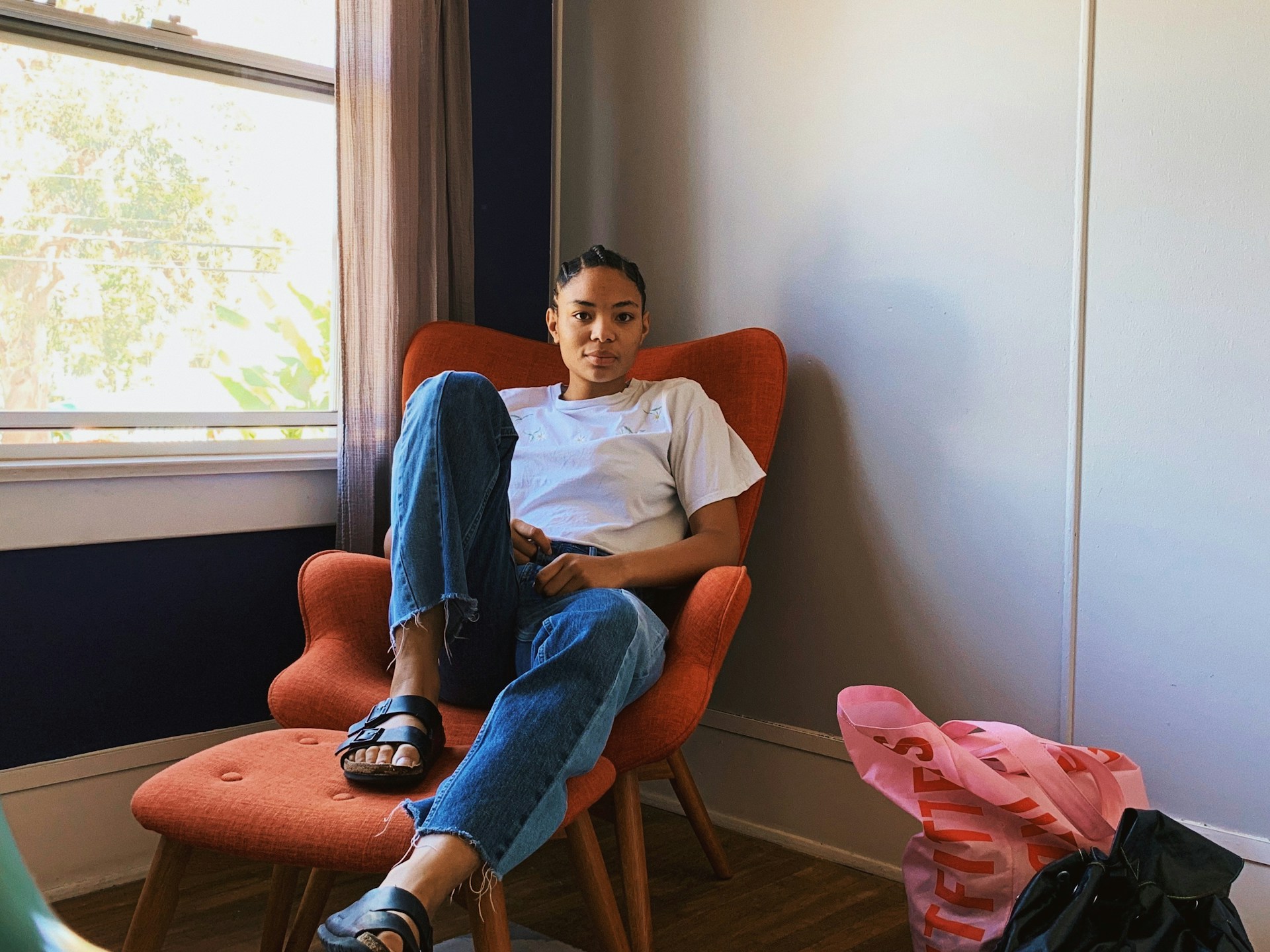 a student sitting in a lazy chair
